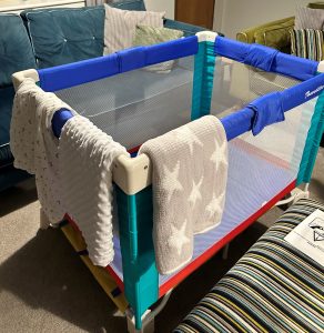 travel cot with bedding